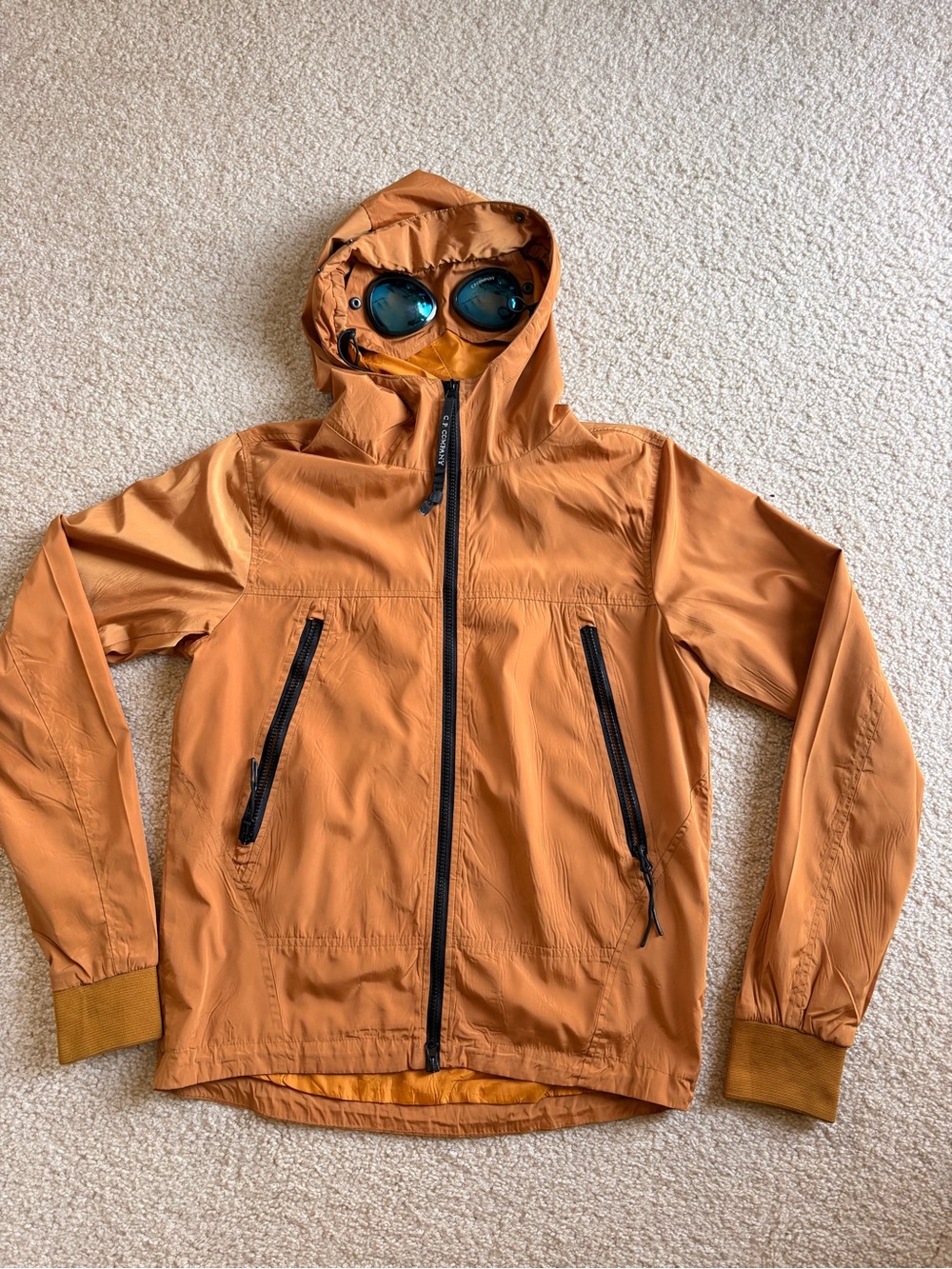 C.P. Company Orange Jacket with Red Nyber Patch